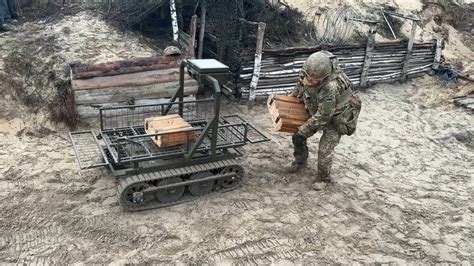 Ukrainian soldiers train to use ground robots for combat medevac