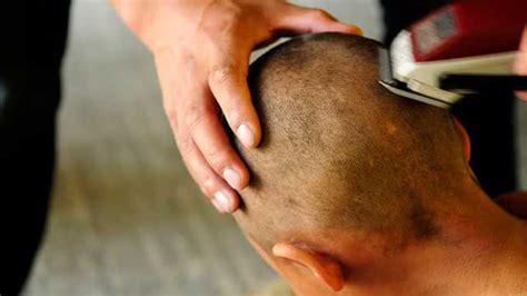 Hyderabad teacher shaves student's head over long hair, parents protest