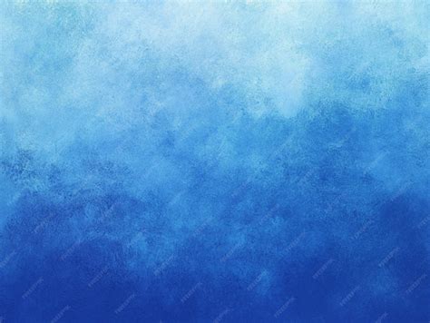 A blue background with a texture of clouds and a blue background ...