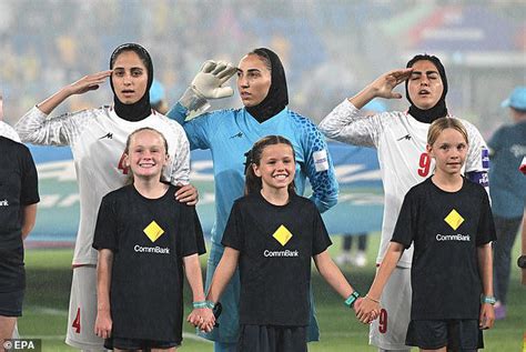 Iran football stars backflip on national anthem with telling gesture ...
