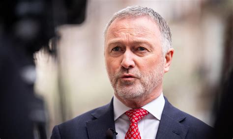 Cabinet minister is dubbed a 'hypocrite' for letting staff work four-day weeks on full pay