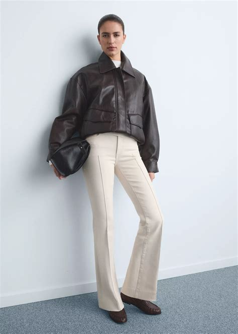 Mid-rise flared jeans - Women | MANGO OUTLET USA