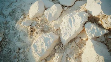 White Limestone Rocks Forming Natural Ground Texture Stock Footage ...