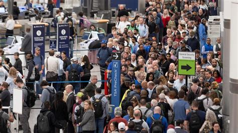 US air system under strain: frozen funding, ICE agents in airports ...