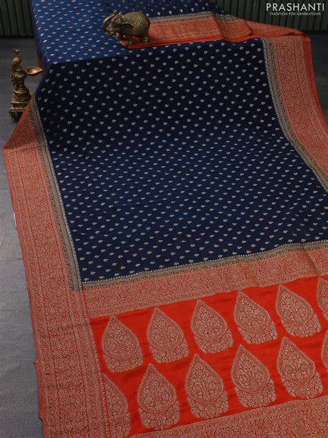 Banarasi semi crepe saree peacock blue and orange with woven buttas an ...