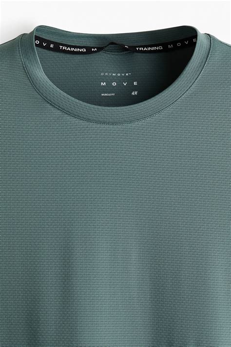 Muscle Fit Sports top with DryMove™ - Dusty green - Men | H&M IN