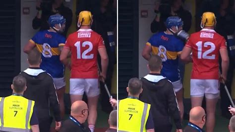 Watch shocking moment bottle is THROWN at Cork GAA star during heated half-time scenes in All ...