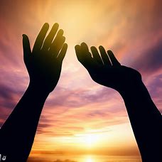 Create a beautiful and peaceful image of a person extending their hand in forgiveness against a sunset sky.