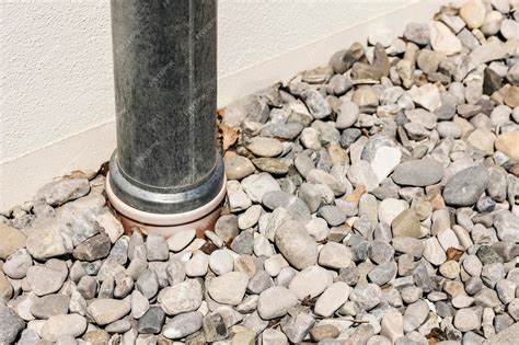Premium Photo | Drain gravel, pebble, stone with sewer pipe. drainage ...