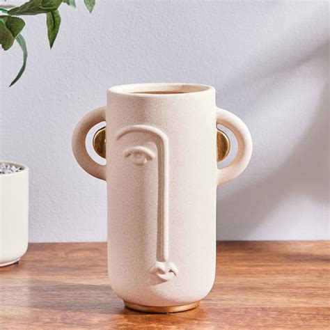 Buy Marshmallow Ceramic Human Face Vase from Home Centre at just INR 1099.0