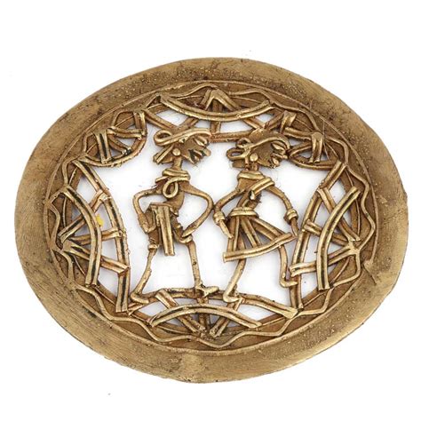 Old Brass Vase With Golden Floral Design At The Base