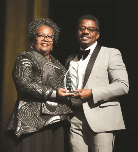 Dr. Michele Norman presents Dr. Tim Hunter with the Together We Can ...