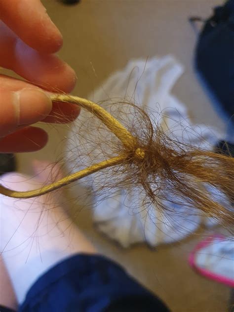 don't we all just love getting hair ties stuck in our hair? : r ...