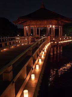 Download wallpaper 240x320 gazebo, bridge, lights, water, dark old ...