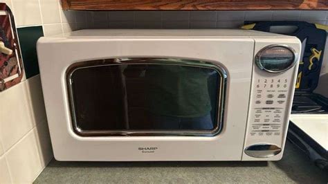 Image result for How to Set Time On Sharp Carousel Microwave