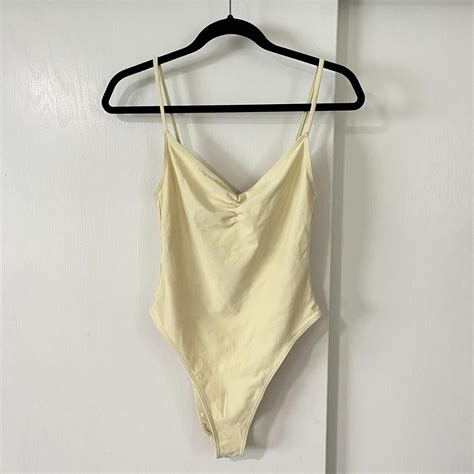 Yellow One Piece Swimsuit. Pale yellow one piece... - Depop