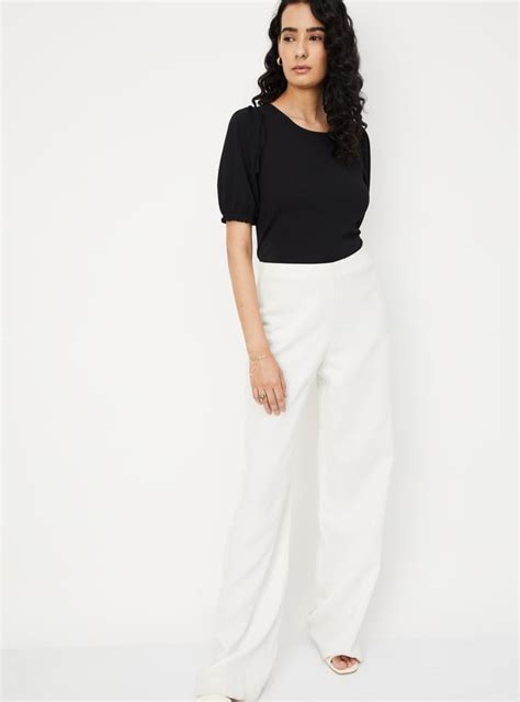 Buy Women Solid Puffed Sleeves Top Online at just Rs. 699.0 ...