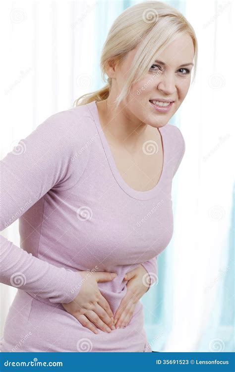 Woman with stomach pain stock image. Image of hands, person - 35691523