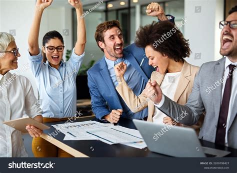 Multi Etnich Group of Business People Celebrating Together 的图像结果