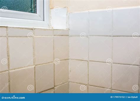 Bad Tiling. Terrible Bathroom Tile DIY Fixing and Grouting Job Stock ...