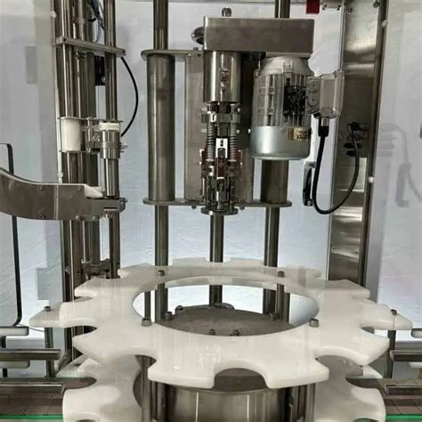 Image result for Ropp Capper Machine