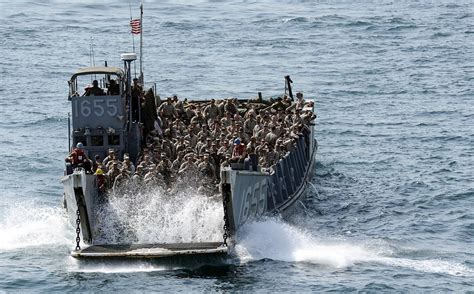 world war two - Normandy: Why did the landing craft open on the front? - History Stack Exchange