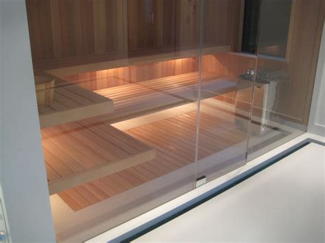 FAS built sauna with glass wall, floating benches and inset flush cedar ...