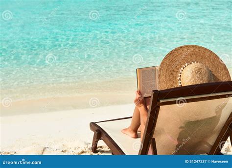 Young Woman Reading a Book at Beach Stock Image - Image of leisure ...