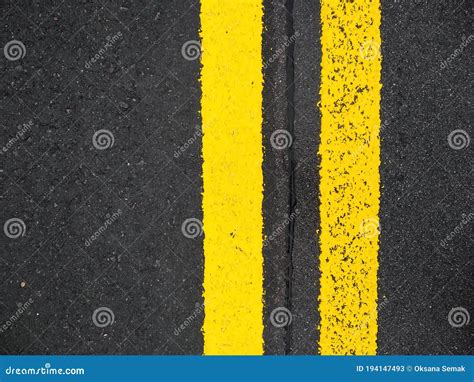 Close-up Yellow Dividing Lines on the Road with Copy Space. Yellow ...