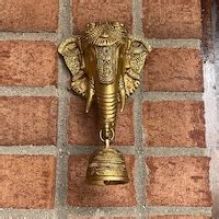 Buy Hanging Sukhasana Laxmi With Prabhavali Frame & Laxmi Diya Lamp ...