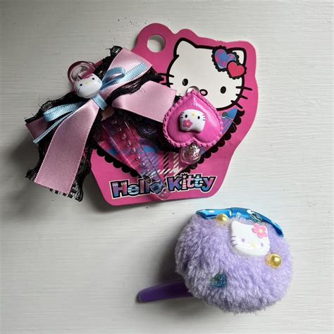 set of three y2k sanrio hello kitty hair clips! both... - Depop