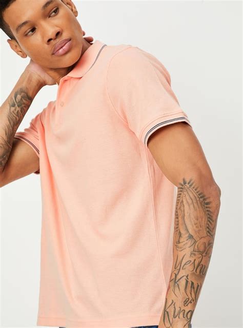 Buy Men Regular Fit Solid Polo T-shirt Online at just Rs. 499.0 ...