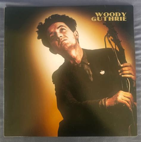 Woody Guthrie This Machine Kills Fascists - Gold/Black Splatter Vinyl ...