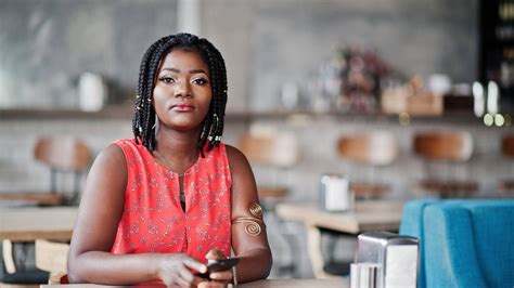 Download Deep Thought - Portrait of an African Woman Wallpaper | Wallpapers.com