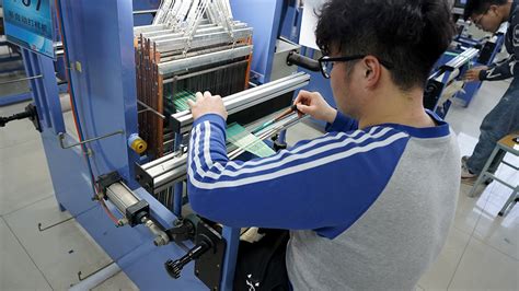 纺织工程系完成纺织面料开发“1+X”职业技能等级证书考评工作-纺织工程系