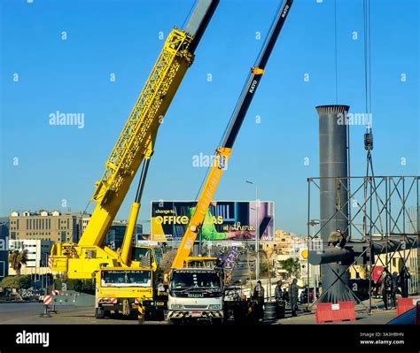 Cairo, Egypt, February 27 2025: mobile cranes fitting a steel structure ...