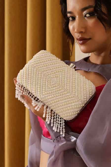 Buy White Pearls Work Clutch Bag by The Tan Clan Online at Aza Fashions.