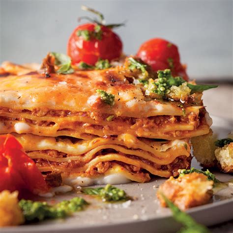 Cheat's lasagne with oven-roasted vine tomatoes and basil pesto