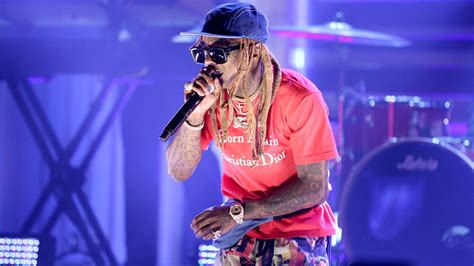 Lil Wayne concert ends after crowd panics over false gunshot reports ...