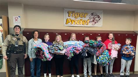 Stewartville class makes blankets for Olmsted County Sheriff’s Office