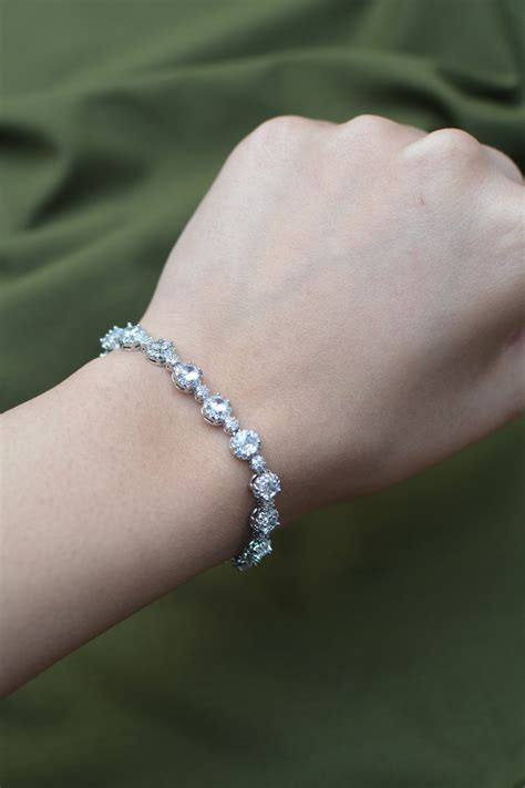 SILVER COLOUR ROUND TENNIS BRACELET – Heer House Of Jewellery