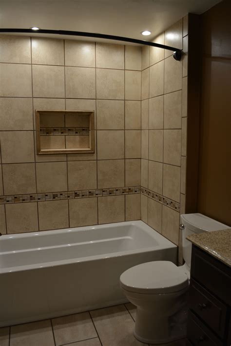 Ceramic Tile Tub Surround with Niche and Mosaic Accents