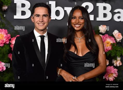 Juan David Borrero, left, and Jasmine Tookes arrive at the 2022 ...