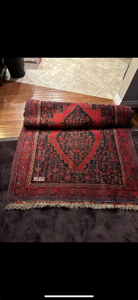 Found this rug at the rose bowl flea would like to know some more info ...