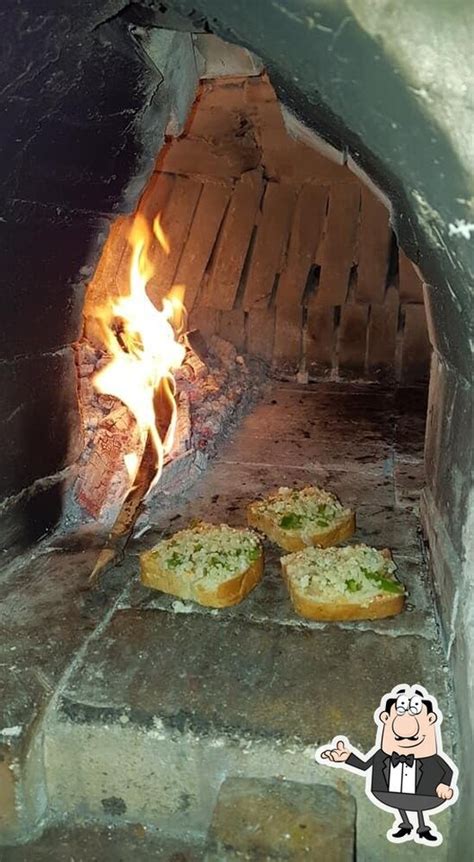Cafe Nostalgia Wood Fired Pizza, Jaipur - Restaurant menu, prices and ...