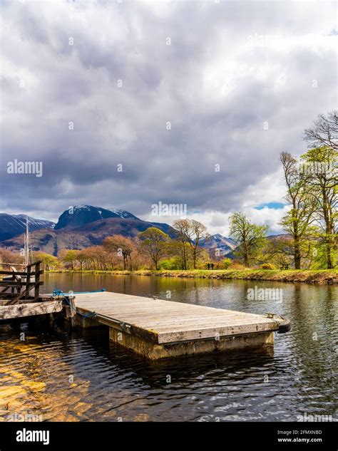 A view across the Caledonian Canal looking towards Ben Nevis which is ...