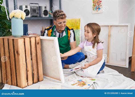 Father and Daughter Artists Smiling Confident Drawing at Art Studio ...