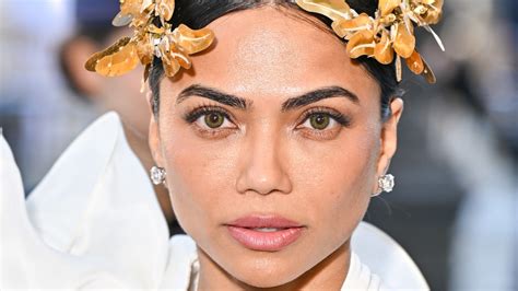 Mona Patel wore a Stéphane Rolland couture dress with gold-plated olive ...