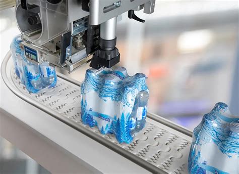 M230i-TB | Contactless Automatic Label Applicator Machine | Domino Printech