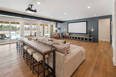 Bar Table and Chairs Behind Sofa | Contemporary home theater design ...